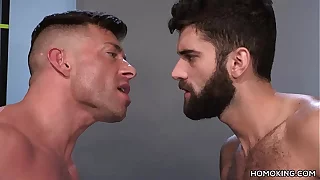 Muscular men sharing the ass of a bearded guy
